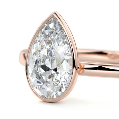 PEAR BEZEL SOLITAIRE RING