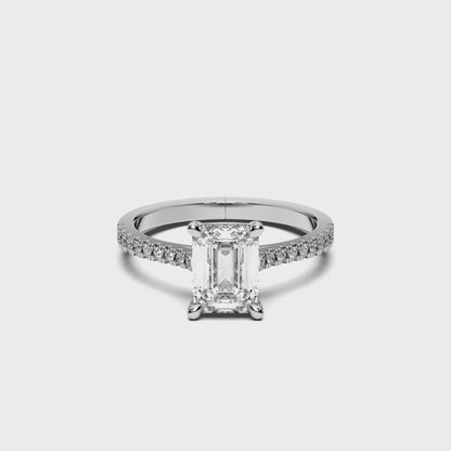 EMERALD HIDDEN HALO WITH SIDE STONE