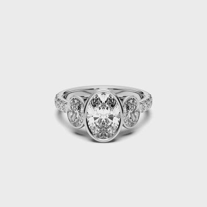 OVAL 3 STONE BEZEL WITH SIDE STONE RING
