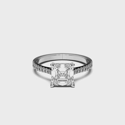 SQ.EMERALD HIDDEN HALO WITH SIDE STONE